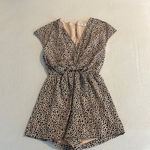 Adorable animal print romper.